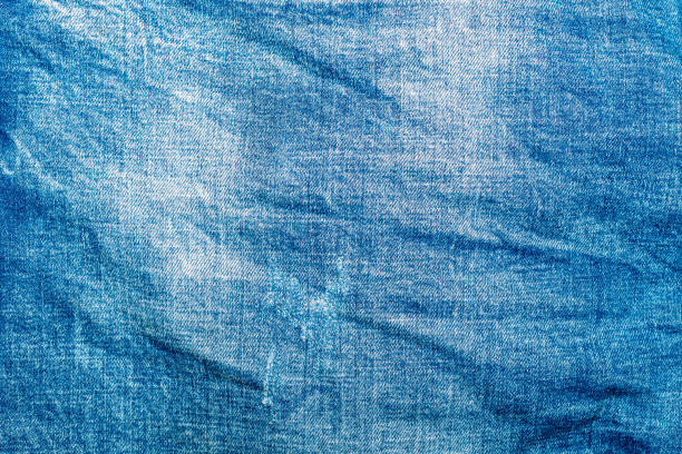 istock Light blue shabby jeans. Denim fabric. Aged in production 1226984218