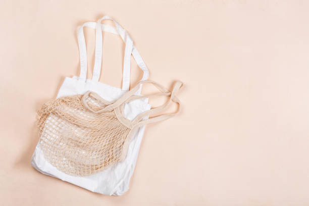 istock Cotton reusable bag on a beige canvas background 1226985532