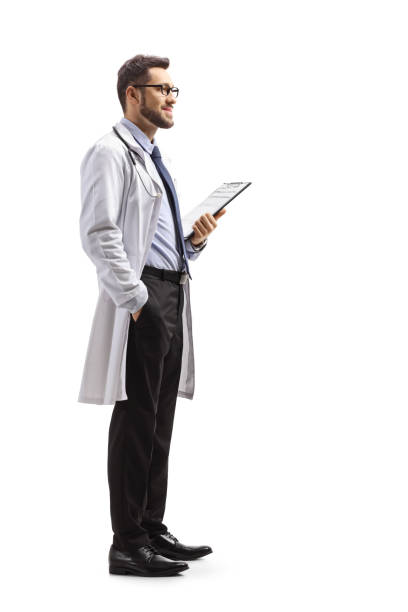 istock Young male doctor holding a clipboard 1226985555