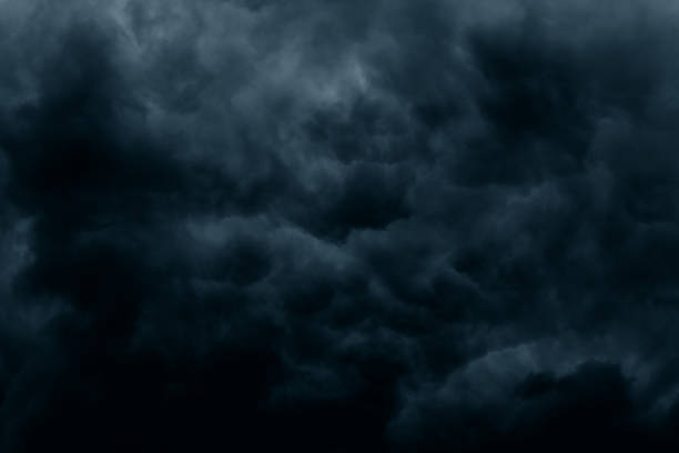 Stormy rain big fluffy clouds. Dark sky. Natural scenic abstract background. Weather changes backdrop. Sky filled with voluminous clouds.