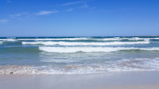 istock Sandy beach and blue sea 1226988662