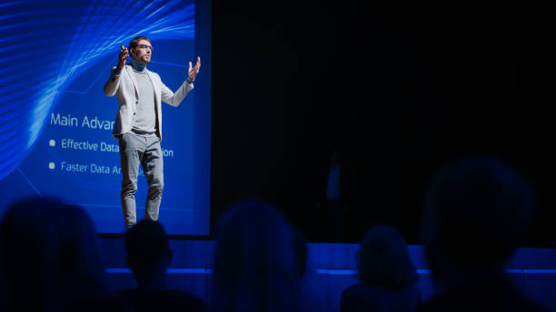 istock Startup CEO invites on Stage Software Develope Presents New Product. Expert Does Motivational Talk. Speaker does Lecture about Science, Technology, Entrepreneurship, Health, Development, Leadership 1226991802