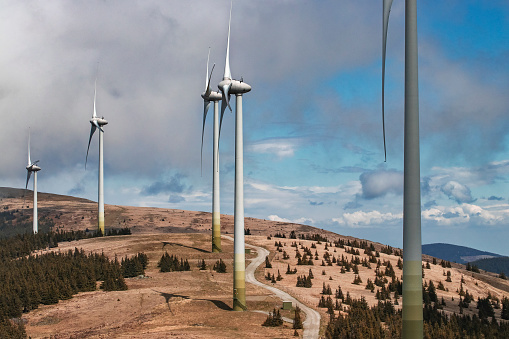 Wind turbines summer autumn landscape