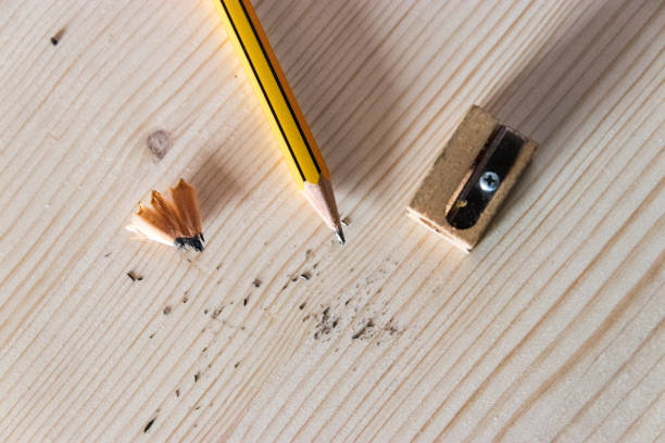 istock Graphite pencil, pencil sharpener and pencil shavings 1226995289