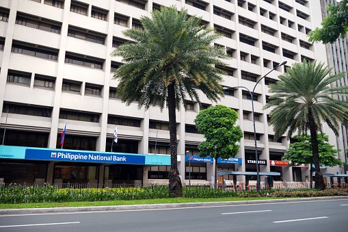 Makati, Manila, Philippines - May, 26, 2020: Empty Ayala avenue during coronavirus covid quarantine ECQ