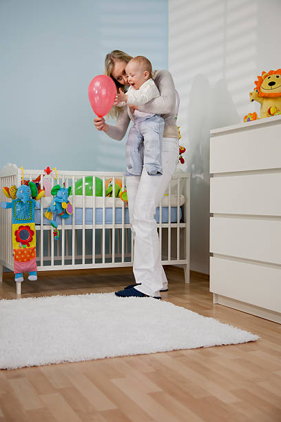 istock Mother Playing With Her Baby Boy 122699986