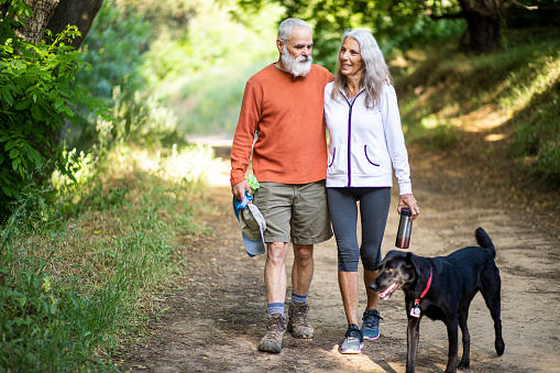 Active senior couple on a hike outdoors