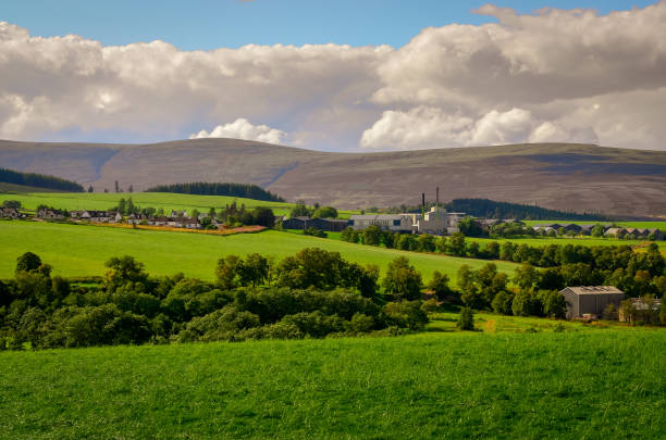 MORAY, SCOTLAND, UNITED KINGDOM - 7 SEPTEMBER 2013: Landscape view of Glenlivet distillery, hills and meadows, Scotland, UK stock photo