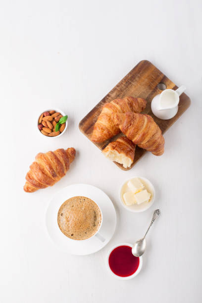 istock Fresh delicious breakfast with coffee and croissants 1227004050