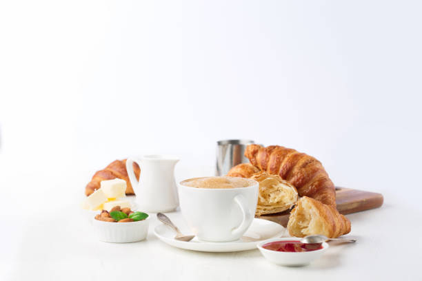 istock Fresh delicious breakfast with coffee and croissants 1227004100