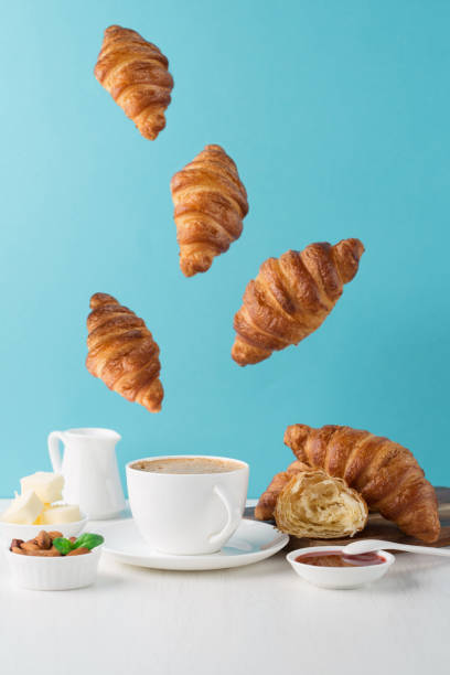 istock Fresh delicious breakfast with coffee and croissants 1227004114