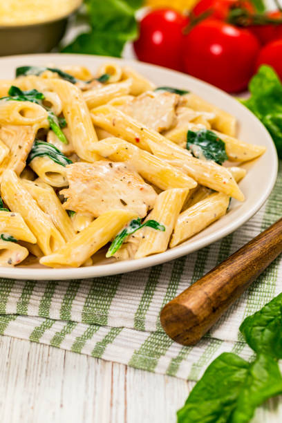 istock Chicken Alfredo with Spinach Penne Pasta 1227006943