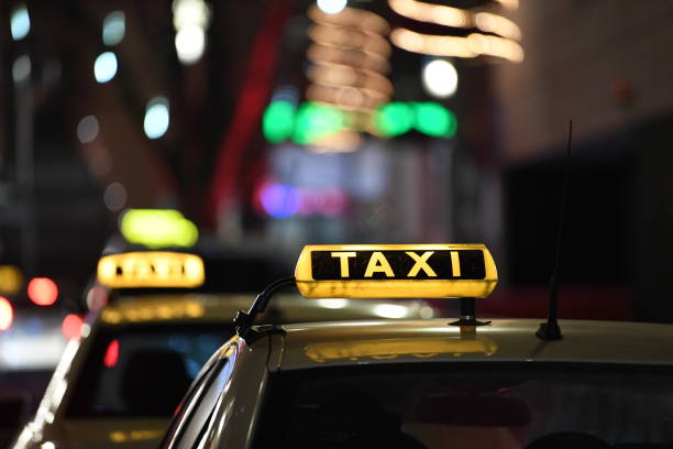 istock Taxi line at night 1227007206