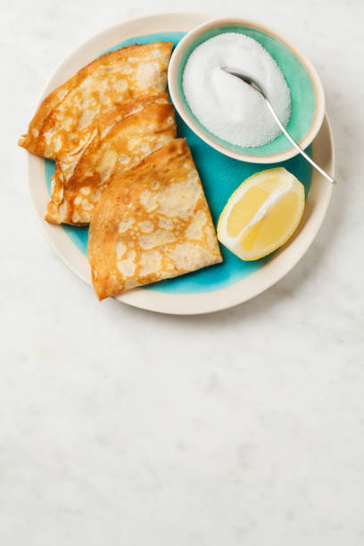 istock Shrove Tuesday pancakes with lemon 1227007574