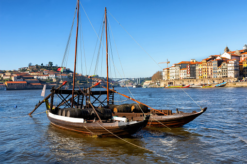 Panorama of Porto is the most famous bridge and boats to transport wine along the Douro River