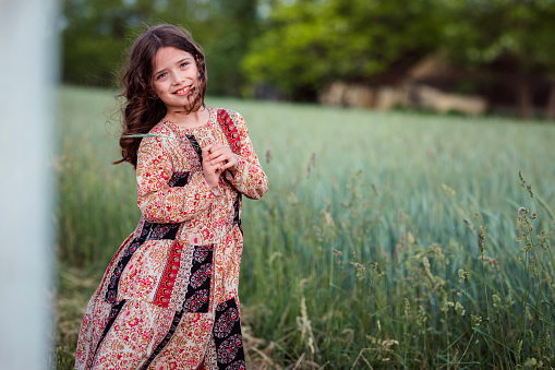 Young child posing in nature
