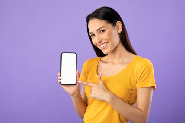 Girl showing white blank cell phone screen