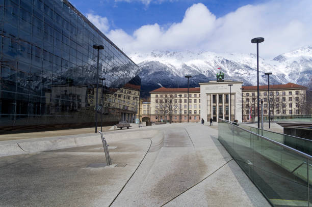 Innsbruck, Austria - March 3, 2020: Monument to the fallen for freedom of Austria. Landhausplatz Square. Russian and Frehch words on the top mean: \