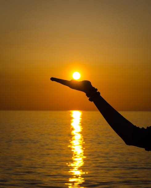 istock Girl holding the Sun 1227009859
