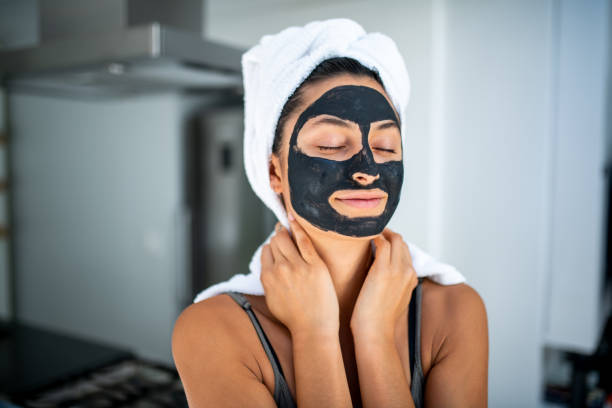 istock Smiling woman having a spa day at home. 1227014988