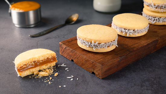 Traditional Alfajores (Alfajor) with dulce de leche and grated coconut - Traditional Argentine sweet