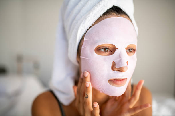 istock Young Latin woman applying face mask 1227016294