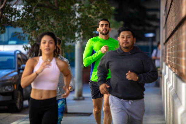 istock Latino Runner Catching Up with Friends 1227020341