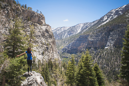 A woman hiking in the mountains