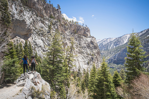 Two women hiking in the mountains.