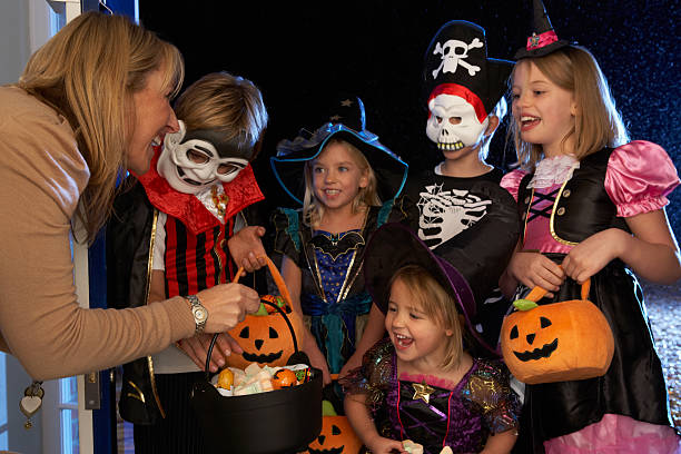 istock Halloween party with children trick or treating 122702843