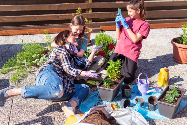 istock Planting plants with kids on home terrace 1227030528