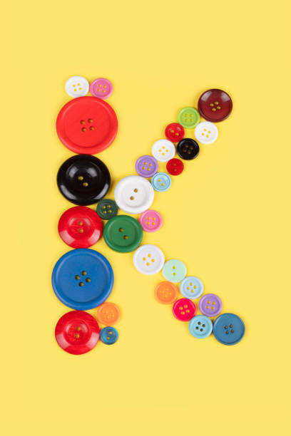 istock Letter K made of sewing buttons 1227030725