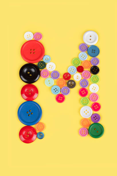istock Letter M made of sewing buttons 1227030741