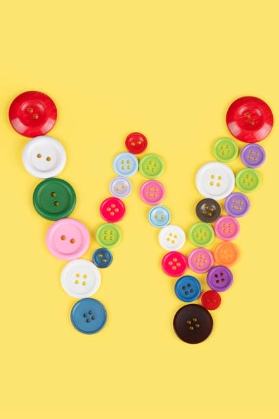 istock Letter W made of sewing buttons 1227030805