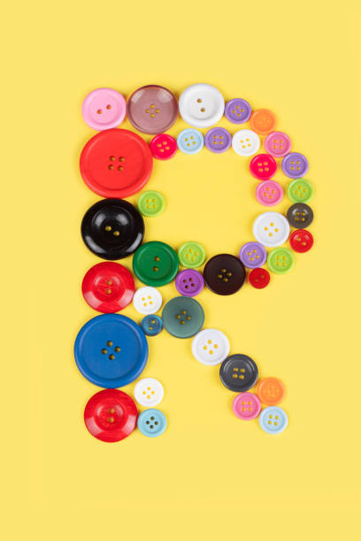 istock Letter R made of sewing buttons 1227030887
