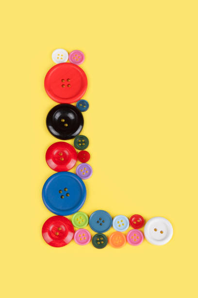 istock Letter L made of sewing buttons 1227030938