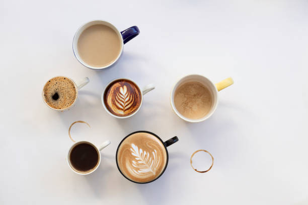 istock Many cups of coffee on white background. Top view space for text 1227031977