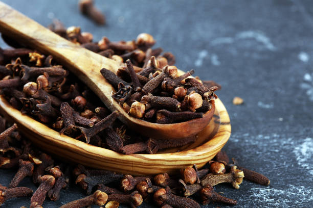 istock freshly dryed cloves spice texture on background 1227032715