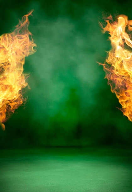 istock Flames in a green background 1227033004