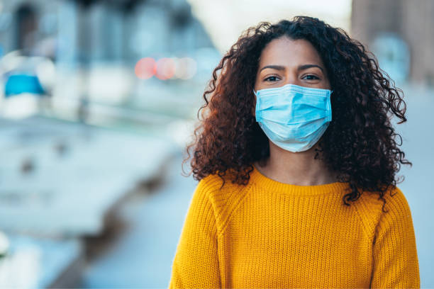 istock Woman with face protective mask 1227033880