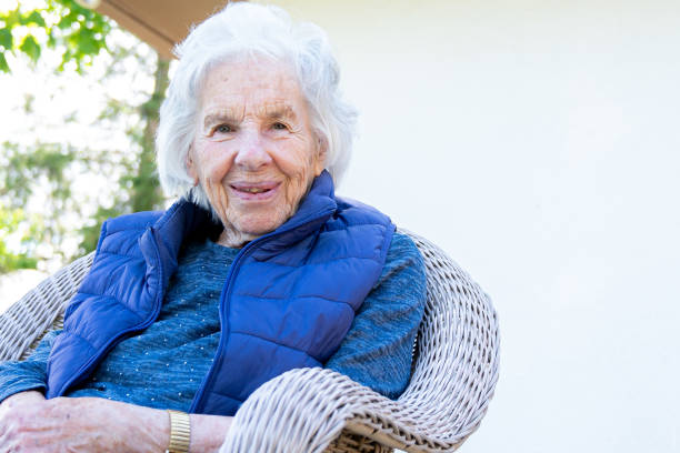 Beautiful 90 Plus Year-Old Elderly Senior Caucasian Woman Sitting Outdoors in the Summer Beautiful 90 Plus Year-Old Elderly Senior Caucasian Woman Sitting Outdoors in Shade in the the Summer 90 plus years photos stock pictures, royalty-free photos & images