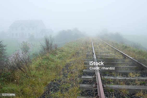 Old Railroad And House Vanishing In Fog Stock Photo - Download Image Now - Autumn, Color Image, Dawn