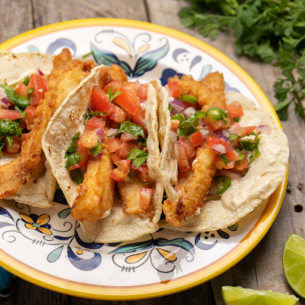istock Mexican breaded fish tacos also called ensenada on wooden background 1227039311