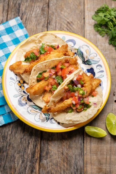 istock Mexican breaded fish tacos also called ensenada on wooden background 1227040010