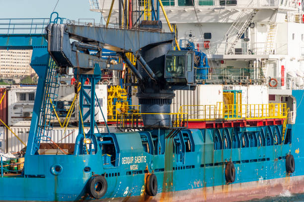 New Bedford, Massachusetts, USA - May 16, 2020: Massive crane aboard Geoquip Saentis, a 250-foot research vessel equipped with a drill rig and helipad