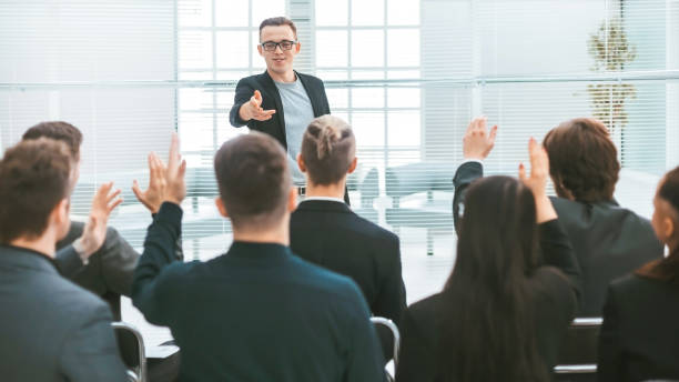 istock speaker by asking questions during the seminar 1227044850