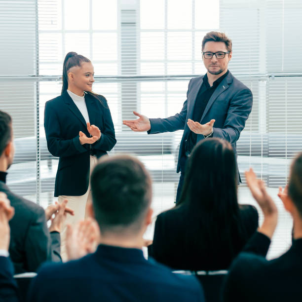 istock business team applauding at a work meeting 1227044865