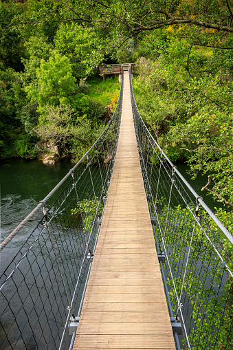 This suspension bridge is located halfway between the walkways.