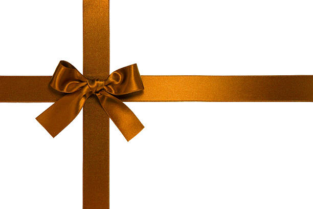 istock golden-brown cross ribbon with bow 122704687
