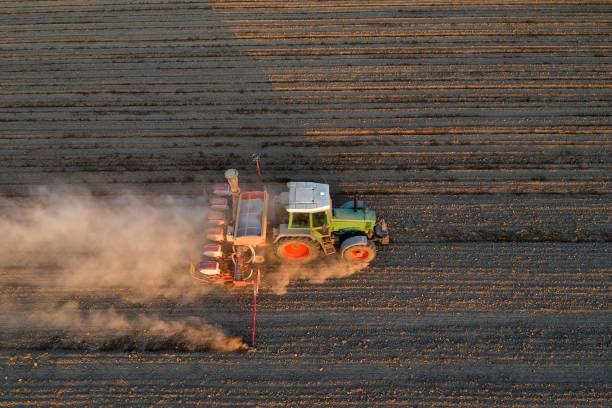 istock Tractor Seeding Wheat, Aerial View 1227047270